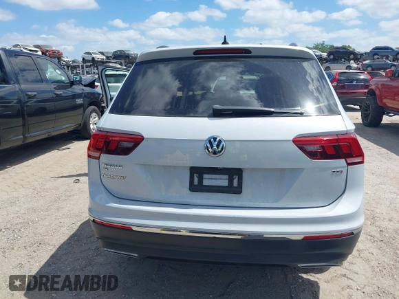 2018 Volkswagen Tiguan SEL with VIN 3VV3B7AX5JM053045, listed as a IAAI auction lot 41963017 with 77,495 mi miles and . Bid and sale history available at DreamBid. Image 16.
