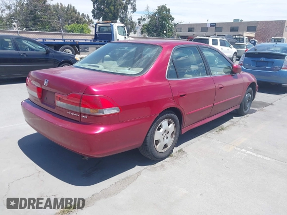 2001 Honda Accord EX with VIN 1HGCG16571A036914, listed as a IAAI auction lot 42670933 with 129,234 mi miles and . Bid and sale history available at DreamBid. Image 4.