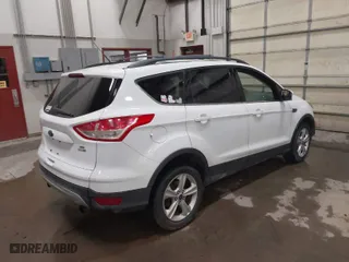 2013 Ford Escape SE with VIN 1FMCU9G9XDUA95140, listed as a IAAI auction lot 41771048 with 167,059 mi miles. Bid and sale history available at carsss.com. Image 4.