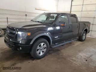 2014 Ford F-150 XL with VIN 1FTFW1ETXEFC51095, listed as a Copart auction lot 53995715 with 246,592 mi miles and Clean Title. Bid and sale history available at carsss.com. Image 1.