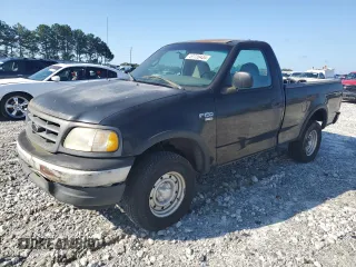 2000 Ford F-150 XL with VIN 1FTRF18W9YNB95521, listed as a Copart auction lot 57720434 with 203,143 mi miles and Clean title. Bid and sale history available at DreamBid. Image 1.