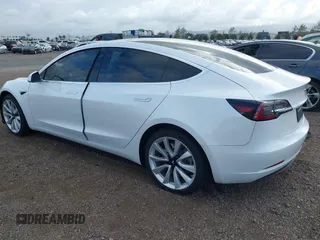 2019 Tesla Model 3 Long Range with VIN 5YJ3E1EBXKF512710, listed as a IAAI auction lot 42063737 with 90,721 mi miles and . Bid and sale history available at DreamBid. Image 3.