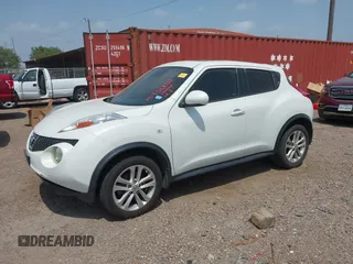 2013 Nissan Juke SV with VIN JN8AF5MR4DT225880, listed as a IAAI auction lot 41932207 with 212,193 mi miles. Bid and sale history available at carsss.com. Image 2.