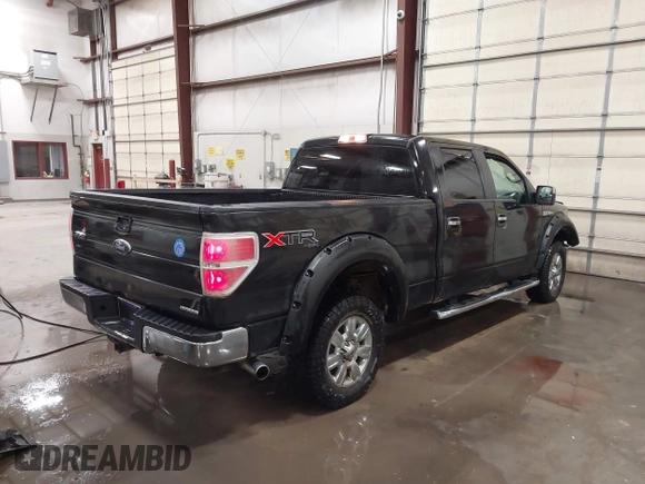 2011 Ford F-150 XL with VIN 1FTFW1EFXBKD42235, listed as a IAAI auction lot 41812147 with 220,144 mi miles. Bid and sale history available at carsss.com. Image 4.