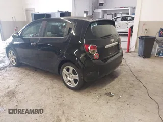 2016 Chevrolet Sonic LTZ z VIN 1G1JE6SB3G4150803, wystawiony jako IAAI lot #42007951 z przebiegiem 124 811 mil mil oraz . Historia ofert i sprzedaży dostępna na DreamBid. Obrazek 3.