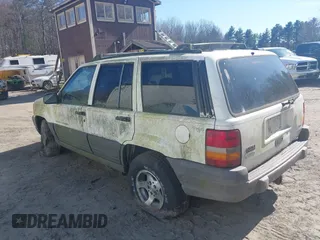 1996 Jeep Grand Cherokee Laredo with VIN 1J4GZ58Y7TC381600, listed as a IAAI auction lot 42065681 with 1 mi miles. Bid and sale history available at carsss.com. Image 3.