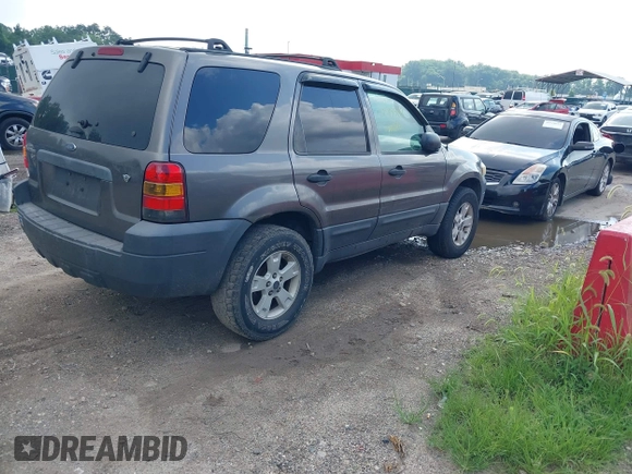 2006 Ford Escape XLT with VIN 1FMCU93106KA37648, listed as a IAAI auction lot 42719362 with 184,321 mi miles and . Bid and sale history available at DreamBid. Image 4.