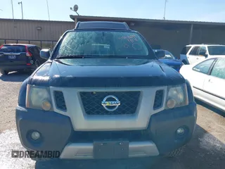 2012 Nissan Xterra S with VIN 5N1AN0NW2CC521142, listed as a IAAI auction lot 41858699 with 214,789 mi miles and . Bid and sale history available at DreamBid. Image 12.