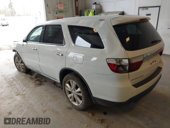 2013 Dodge Durango Crew z VIN 1C4SDJDT3DC540700, wystawiony jako IAAI lot #42097270 z przebiegiem 197 195 mil mil oraz . Historia ofert i sprzedaży dostępna na DreamBid. Obrazek 3.