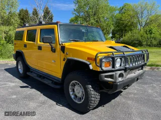 2003 Hummer H2 with VIN 5GRGN23UX3H112710, listed as a Copart auction lot 72082654 with 64,186 mi miles and Salvage Title. Bid and sale history available at carsss.com. Image 1.
