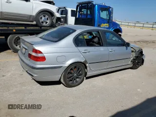 2003 BMW 3 Series 330xi with VIN WBAEW53413PG09450, listed as a Copart auction lot 74111954 with 252,295 mi miles and Salvage Title. Bid and sale history available at carsss.com. Image 3.