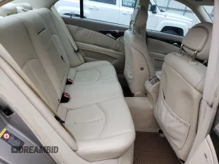 2003 Mercedes-Benz E-Class 3.2L with VIN WDBUF65J93A148116, listed as a Copart auction lot 49144604 with 128,837 mi miles and Clean Title. Bid and sale history available at carsss.com. Image 10.