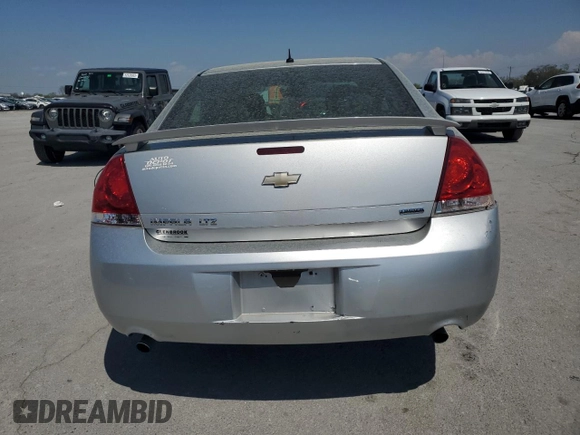 2016 Chevrolet Impala LTZ with VIN 2G1WC5E33G1123591, listed as a Copart auction lot 52493685 with 105,069 mi miles and Salvage title. Bid and sale history available at DreamBid. Image 6.