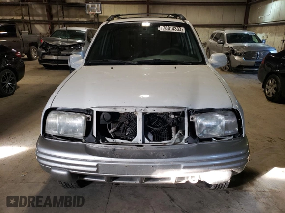 2002 Chevrolet Tracker LT z VIN 2CNBJ634126927635, wystawiony jako Copart lot #78814333 z przebiegiem 224 726 mil mil oraz Szkoda całkowita • Salvage title. Historia ofert i sprzedaży dostępna na DreamBid. Obrazek 5.