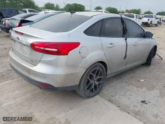2017 Ford Focus SEL with VIN 1FADP3H24HL235375, listed as a IAAI auction lot 41924041 with 129,570 mi miles. Bid and sale history available at carsss.com. Image 4.