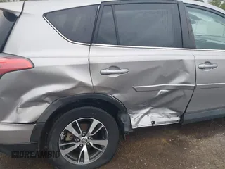 2018 Toyota RAV4 XLE with VIN 2T3WFREV3JW445654, listed as a IAAI auction lot 40849666 with 69,365 mi miles and . Bid and sale history available at DreamBid. Image 6.