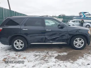 2013 Dodge Durango Crew z VIN 1C4SDJDT7DC684766, wystawiony jako IAAI lot #41277670 z przebiegiem 115 555 mil mil oraz . Historia ofert i sprzedaży dostępna na DreamBid. Obrazek 13.