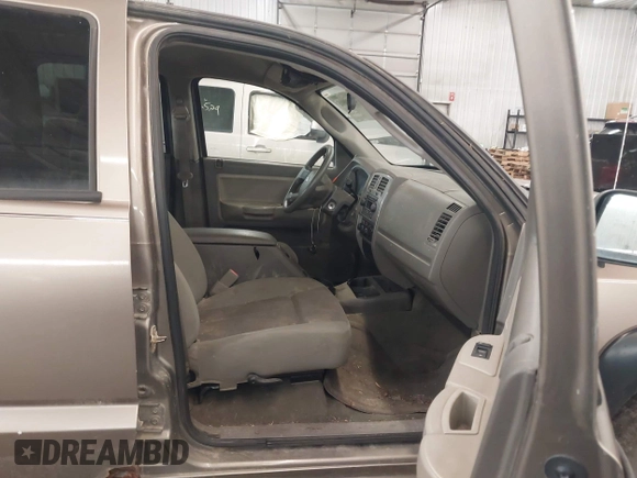 2006 Dodge Dakota SLT with VIN 1D7HE48K36S635377, listed as a IAAI auction lot 42200803 with 156,812 mi miles and . Bid and sale history available at carsss.com. Image 5.