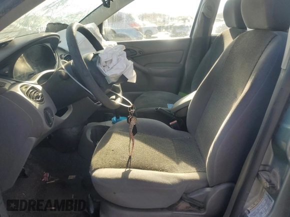 2004 Ford Focus SE with VIN 1FAFP34314W127053, listed as a Copart auction lot 48652265 with 241,841 mi miles and Salvage title. Bid and sale history available at DreamBid. Image 7.