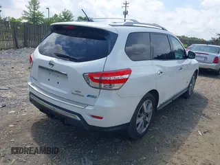 2014 Nissan Pathfinder Platinum Hybrid z VIN 5N1CR2MM1EC638030, wystawiony jako IAAI lot #42469667 z przebiegiem 140 536 mil mil oraz . Historia ofert i sprzedaży dostępna na DreamBid. Obrazek 4.