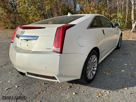 2011 Cadillac CTS Coupe Performance with VIN 1G6DL1ED0B0105668, listed as a Copart auction lot 84887614 with 148,619 mi miles and Clean Title. Bid and sale history available at carsss.com. Image 4.