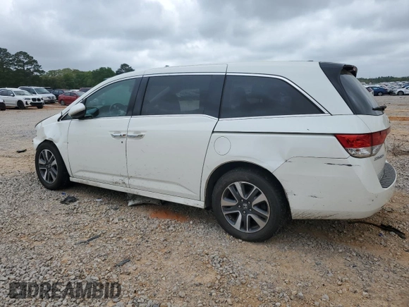 2016 Honda Odyssey Touring Elite with VIN 5FNRL5H91GB075591, listed as a Copart auction lot 51652045 with 126,965 mi miles and Salvage Title. Bid and sale history available at carsss.com. Image 2.
