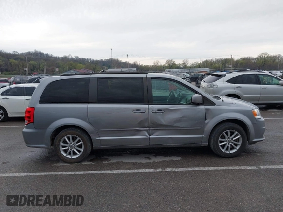 2016 Dodge Grand Caravan SXT with VIN 2C4RDGCG3GR321933, listed as a IAAI auction lot 41895209 with 186,502 mi miles and . Bid and sale history available at DreamBid. Image 13.