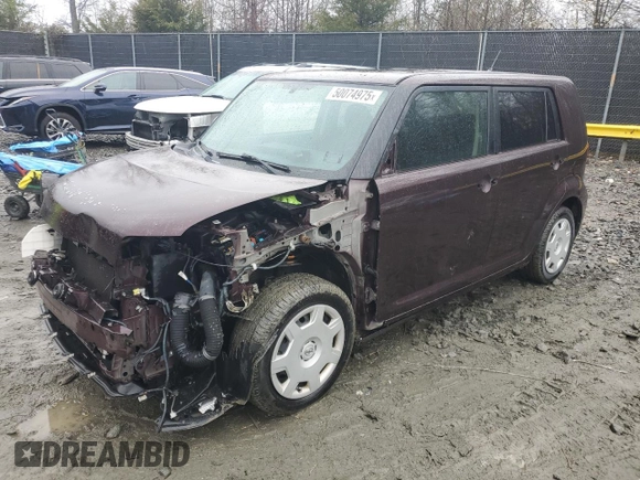 2012 Scion xB with VIN JTLZE4FEXC1144970, listed as a Copart auction lot 50074975 with 218,799 mi miles and Salvage Title. Bid and sale history available at carsss.com. Image 1.