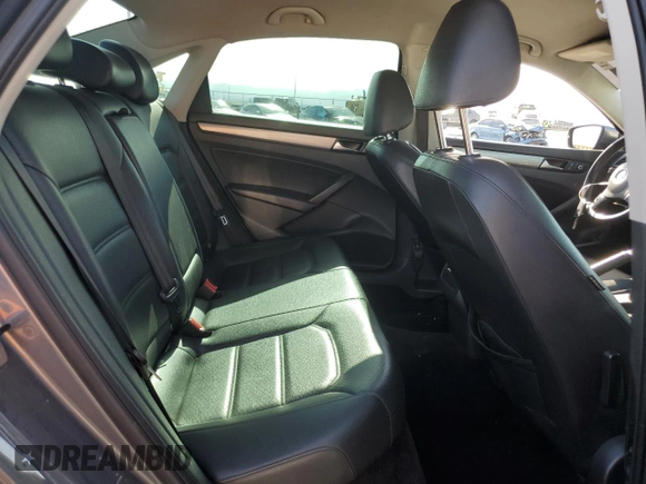 2014 Volkswagen Passat Wolfsburg Edition with VIN 1VWAT7A34EC082377, listed as a Copart auction lot 52820235 with 196,901 mi miles and Salvage title. Bid and sale history available at DreamBid. Image 10.