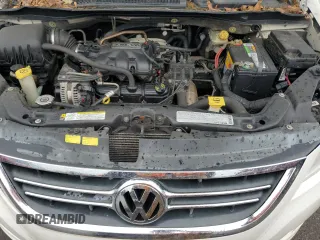 2010 Volkswagen Routan SE z VIN 2V4RW3D13AR388249, wystawiony jako Copart lot #58933225 z przebiegiem 177 570 mil mil oraz Czysty tytuł • Clean title. Historia ofert i sprzedaży dostępna na DreamBid. Obrazek 12.