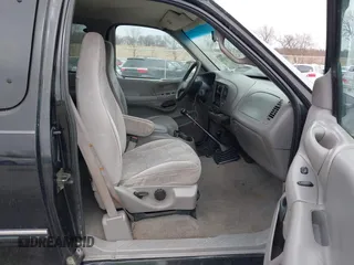 1998 Ford F-150 with VIN 1FTZX1868WKA44830, listed as a IAAI auction lot 41851933 with 240,813 mi miles and . Bid and sale history available at DreamBid. Image 5.