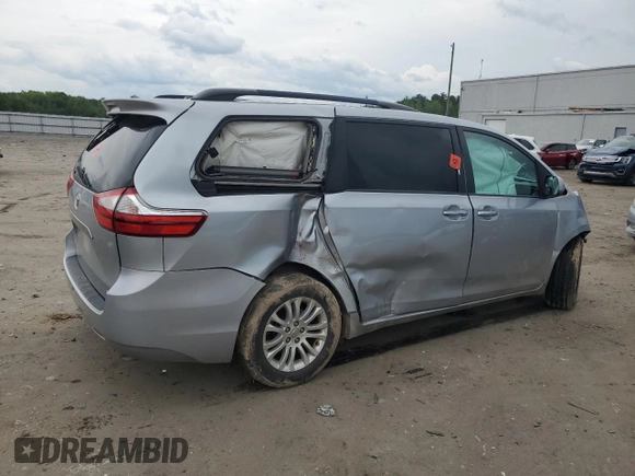 2015 Toyota Sienna XLE с VIN 5TDYK3DC1FS541180, выставлен на аукционе Copart как лот 59078585 с пробегом 94 014 миль миль и Списание • Salvage title. История ставок и продаж доступна на DreamBid. Изображение 3.