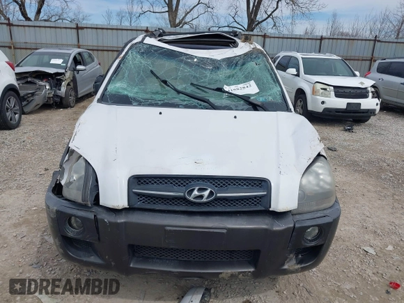 2006 Hyundai Tucson GLS with VIN KM8JN72D26U322893, listed as a IAAI auction lot 41882842 with 116,972 mi miles. Bid and sale history available at carsss.com. Image 12.
