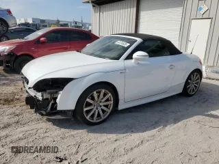 2014 Audi TT Premium Plus with VIN TRUSFAFK0E1003543, listed as a Copart auction lot 44124635 with 122,270 mi miles and Salvage title. Bid and sale history available at DreamBid. Image 1.