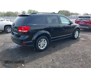 2014 Dodge Journey SXT with VIN 3C4PDCBG2ET262014, listed as a IAAI auction lot 41898343 with 199,732 mi miles. Bid and sale history available at carsss.com. Image 4.