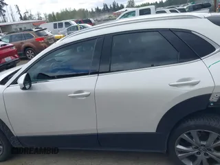 2023 Mazda CX-30 2.5 S Premium Package with VIN 3MVDMBDM7PM522287, listed as a IAAI auction lot 42052660 with 41,336 mi miles. Bid and sale history available at carsss.com. Image 14.