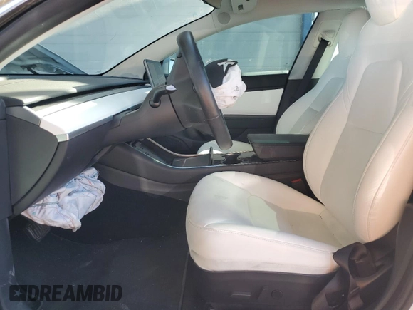 2019 Tesla Model 3 Long Range with VIN 5YJ3E1EB3KF513035, listed as a Copart auction lot 49527535 with 65,880 mi miles and Salvage Title. Bid and sale history available at DreamBid. Image 7.
