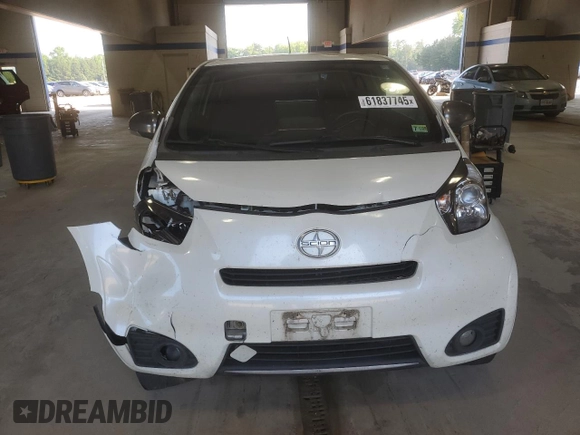 2013 Scion iQ with VIN JTNJJXB00DJ022387, listed as a Copart auction lot 61837745 with 151,944 mi miles and Salvage title. Bid and sale history available at DreamBid. Image 5.