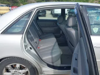 2003 Toyota Avalon XL z VIN 4T1BF28B93U334321, wystawiony jako IAAI lot #42328289 z przebiegiem 138 006 mil mil oraz . Historia ofert i sprzedaży dostępna na DreamBid. Obrazek 8.