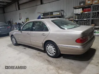2001 Mercedes-Benz E-Class AWD with VIN WDBJF82J71X043474, listed as a Copart auction lot 45512025 with 59,571 mi miles and Salvage Title. Bid and sale history available at carsss.com. Image 2.