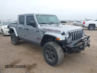 2021 Jeep Gladiator Rubicon z VIN 1C6JJTBG1ML525920, wystawiony jako IAAI lot #41548657 z przebiegiem 22 574 mil mil oraz . Historia ofert i sprzedaży dostępna na DreamBid. Obrazek 1.