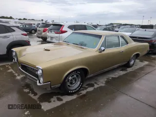 1967 Pontiac GTO z VIN 242077Z108825, wystawiony jako Copart lot #74747314 z przebiegiem 84 793 mil mil oraz Szkoda całkowita • Salvage title. Historia ofert i sprzedaży dostępna na DreamBid. Obrazek 1.