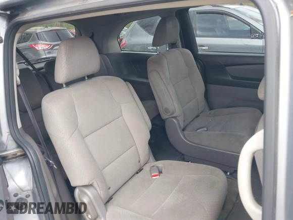 2016 Honda Odyssey LX with VIN 5FNRL5H23GB028338, listed as a IAAI auction lot 41980064 with 186,403 mi miles and . Bid and sale history available at DreamBid. Image 8.