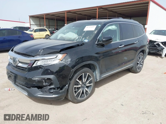 2020 Honda Pilot Touring 8-Passenger with VIN 5FNYF6H91LB003552, listed as a IAAI auction lot 41743685 with 76,725 mi miles and . Bid and sale history available at DreamBid. Image 17.