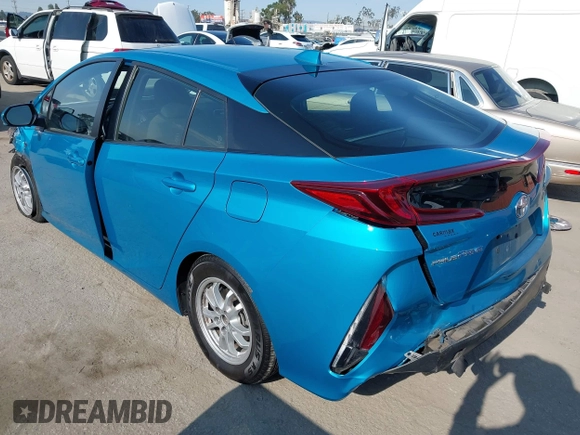 2022 Toyota Prius LE with VIN JTDKAMFP8N3209977, listed as a IAAI auction lot 42777763 with 52,995 mi miles and . Bid and sale history available at DreamBid. Image 3.