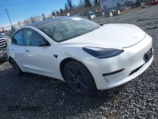 2021 Tesla Model 3 Standard Range Plus z VIN 5YJ3E1EAXMF871730, wystawiony jako IAAI lot #41794274 z przebiegiem 18 791 mil mil oraz . Historia ofert i sprzedaży dostępna na DreamBid. Obrazek 1.
