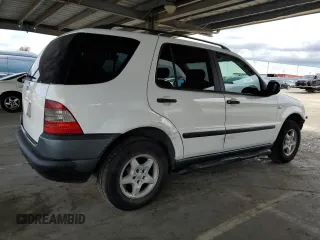 1999 Mercedes-Benz M 320/430/500 with VIN 4JGAB54E9XA130876, listed as a Copart auction lot 51714835 with 191,810 mi miles and Salvage Title. Bid and sale history available at DreamBid. Image 3.