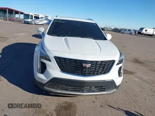 2020 Cadillac XT4 AWD Premium Luxury z VIN 1GYFZDR46LF083118, wystawiony jako IAAI lot #40495567 z przebiegiem 83 224 mil mil oraz . Historia ofert i sprzedaży dostępna na DreamBid. Obrazek 12.