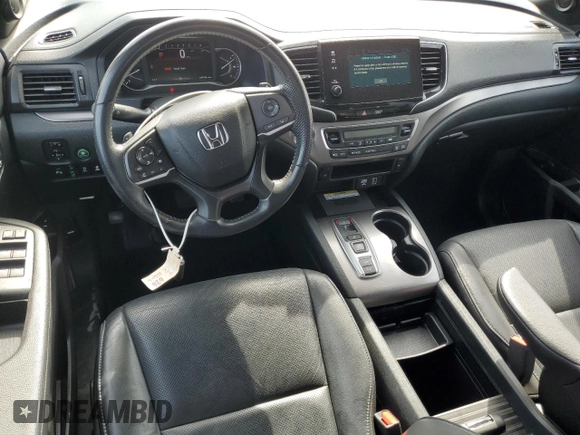 2023 Honda Passport EX-L with VIN 5FNYF8H58PB024039, listed as a Copart auction lot 57269725 with 44,705 mi miles and Salvage title. Bid and sale history available at DreamBid. Image 8.