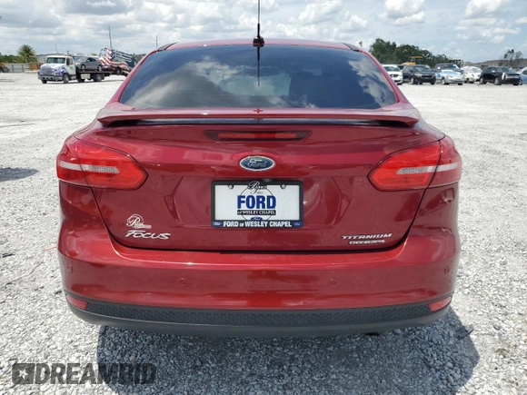 2016 Ford Focus Titanium with VIN 1FADP3J29GL274147, listed as a Copart auction lot 61377575 with 88,181 mi miles and Salvage title. Bid and sale history available at DreamBid. Image 6.